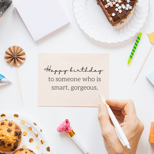 Happy birthday message written on a sticky note with party items