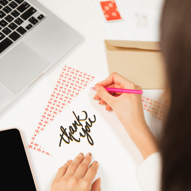 Thank you message written on a card